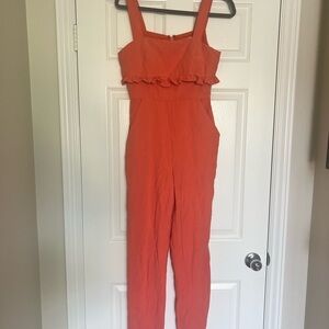 BCBGeneration Vibrant Orange Ruffle Jumpsuit